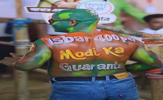 BJP supporters are seen during a rally of PM Narendra Modi in Agartala. PIC- ABHISEK