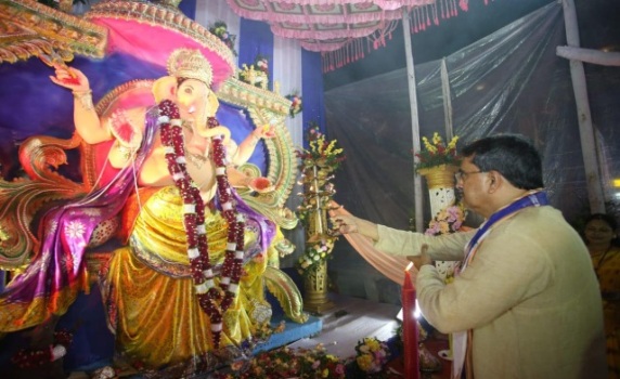 Chief Minister Dr. Manik Saha receives divine blessings during the evening Sri Sri Ganesh Puja at Bishalgarh Mandal