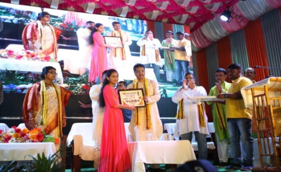 Chief Minister Dr. Manik Saha inaugurates the majestic Sri Sri Ganesh Puja in Majlishpur, applauds the 41-foot glass idol, and hands over a memorandum to students who achieved good results in board exams