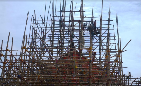 Workers are making a temporary bamboo structure, locally called "Pandel", for the upcoming Durga Puja in Agartala. PIC- ABHISEK 