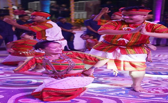 Artists perform with award-winning Durga idols at Tripura Carnival before immersion in Howrah River.