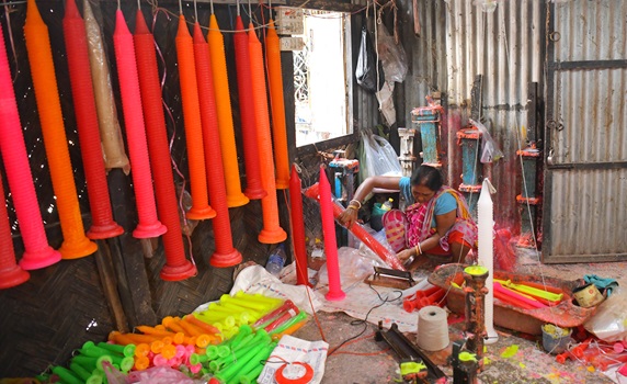 Workers craft vibrant candles in Agartala factory for Diwali, the Hindu Festival of Lights celebration. PIC-Abhisek