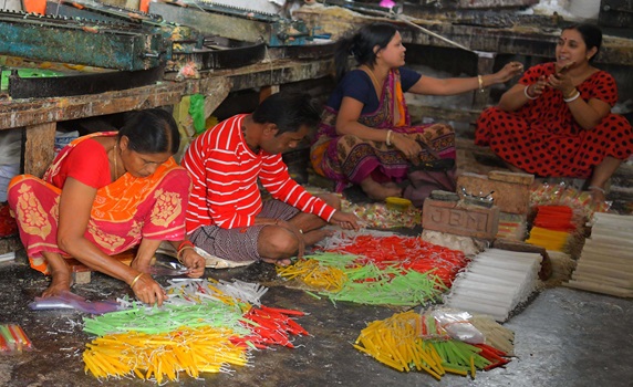 Workers craft vibrant candles in Agartala factory for Diwali, the Hindu Festival of Lights celebration. PIC-Abhisek