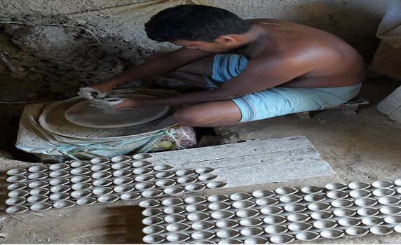 Potter crafting earthen lamps ahead of Diwali festival celebrated December 1st, outskirts of Agartala. PIC- Abhisek 