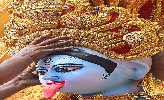 Idol maker adds final touches to Kali and Companions ahead of Agartala