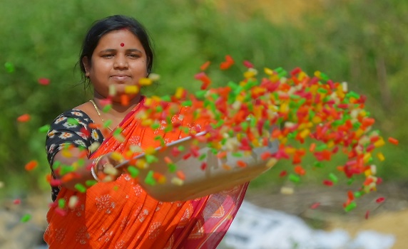 Worker dries finger fryums under the sun at Agartala factory, showcasing local food production. PIC- Abhisek 