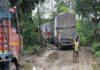 NH-208 Traffic Disrupted as Trucks Sink into Potholes NH-208 Traffic Disrupted as Trucks Sink into Potholes